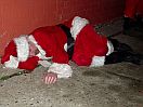 santa sleeping in the alley